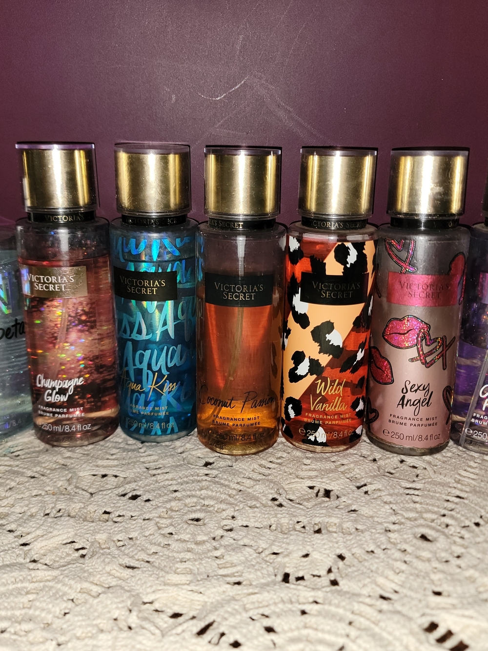 Victoria's Secret assorted body mists in pink, blue, orange, brown, cream